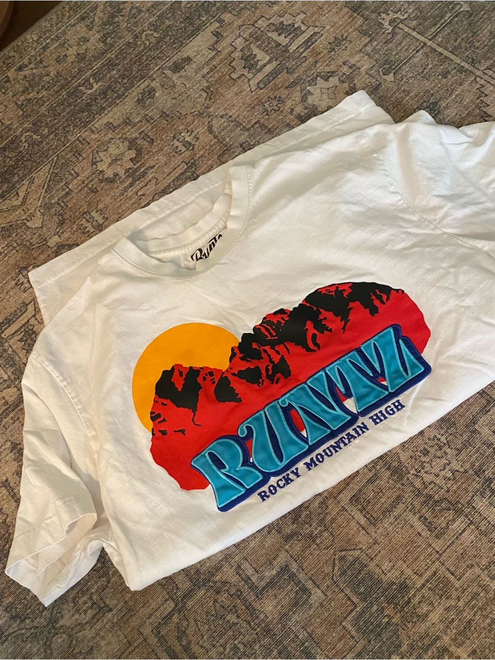 White 'BUENA' Rocky Mountain High Graphic Tee
